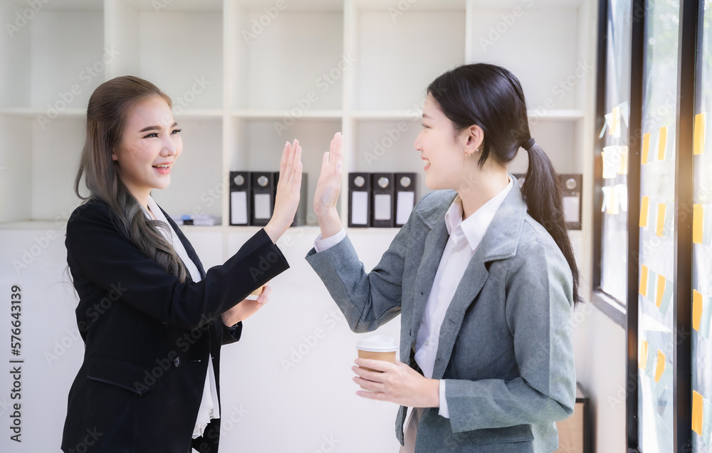 Happy creative business people are motivated, giving high five and celebration successful deal. Cooperation Meeting Partnership Career growth Team building Successful business. Happy creative business people are motivated, giving high five and celebration successful deal. Cooperation Meeting Partnership Career growth Team building Successful business.