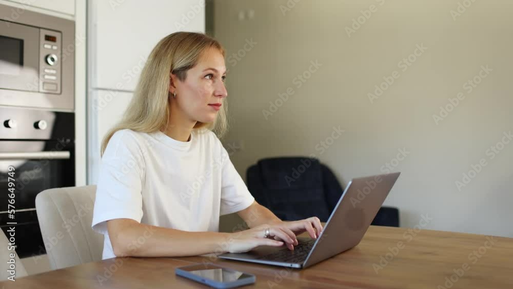 Young blonde girl college student learning online using a laptop Young blonde girl college student learning online using a laptop
