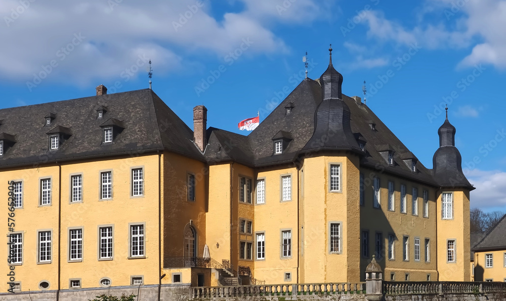Romantic yellow water castle Schloss Dyck in Juechen in Germany