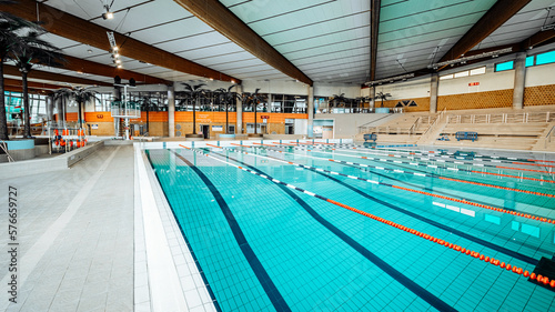 Swimming-Pool with equipment and large windows with a view outside