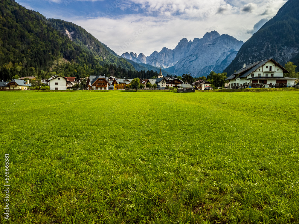 Obraz premium The mountain town of Valbruna and the Julian Alps. Dream nature. Friuli.