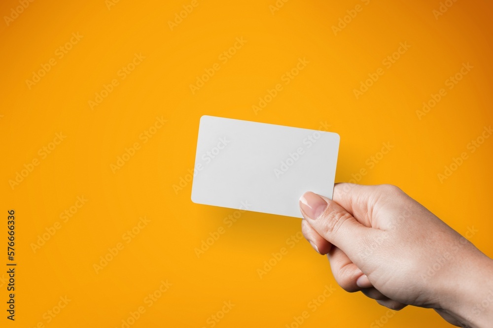 Hand with classic blank bank card Hand with classic blank bank card