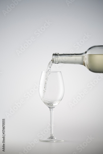 White wine being poured into a wine glass