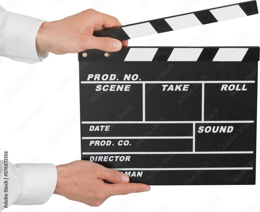 Obraz premium Human hand holds movie clapper board