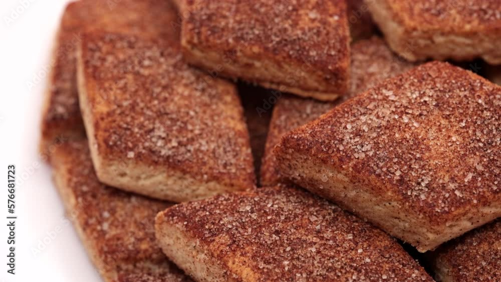 Fresh Sugar Biscuits On White Plate. Panning Dolly Slider Shot. Top View. Food Concept On Orange Background. 4k, 60 FPS, ProRes Fresh Sugar Biscuits On White Plate. Panning Dolly Slider Shot. Top View. Food Concept On Orange Background. 4k, 60 FPS, ProRes