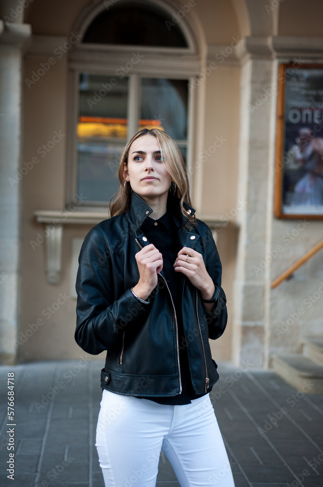 Fototapeta premium Woman wearing casual clothes walking on the street