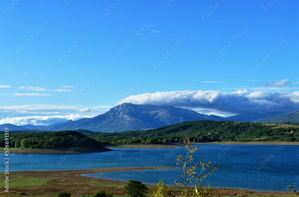 Panoramic view with lake and clouds