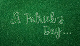 Happy St Patrick's Day decoration background concept made from green glitter paper and the text.