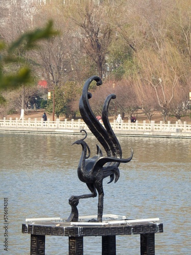 Sculpture of Rosefinch, a sacred beast in the Yellow River landscape in China