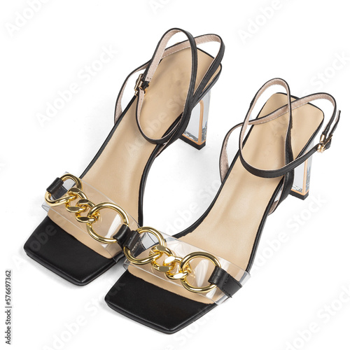 Black women's sandals on a medium transparent wide heel with a beige insole and a blunt toe on a white background