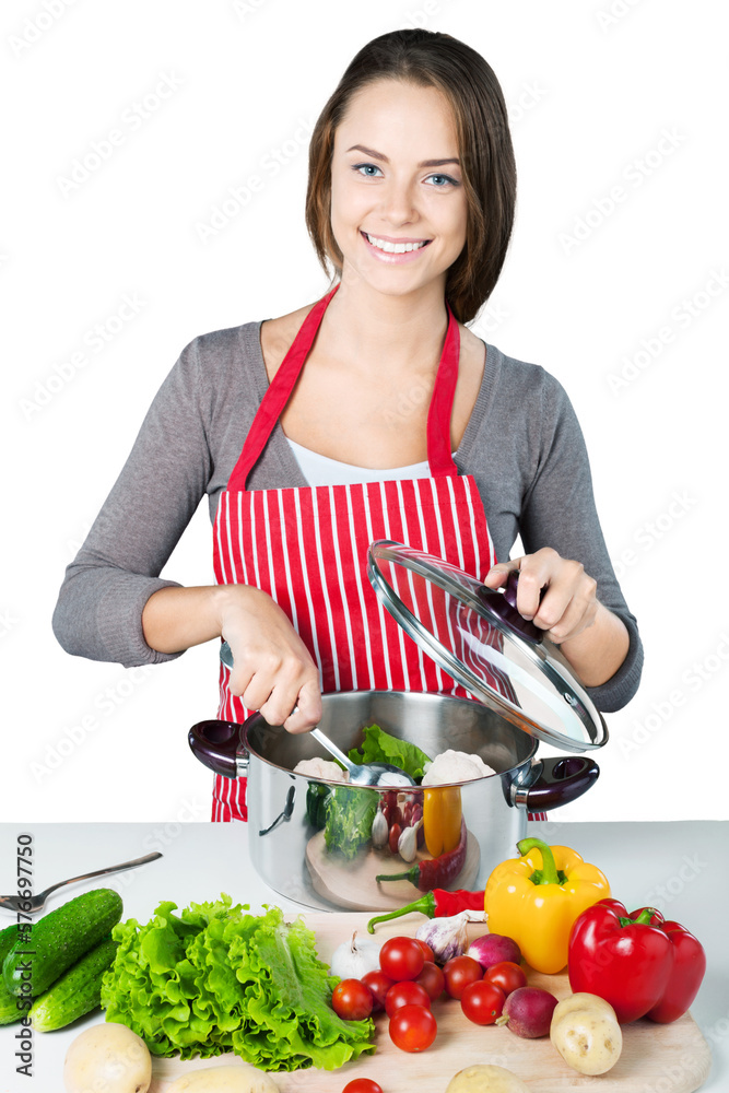 Young beautiful woman Cooking in kitchen Young beautiful woman Cooking in kitchen