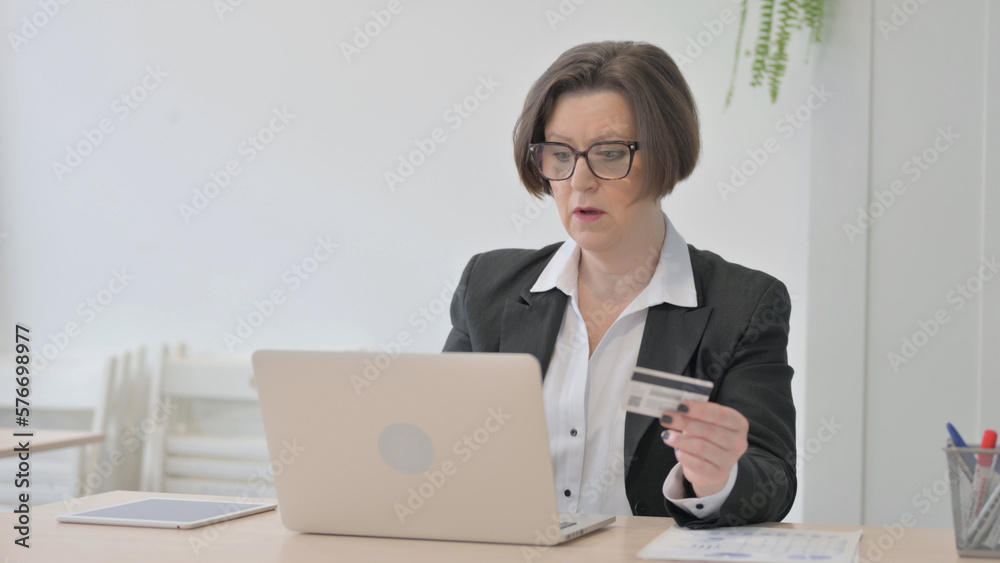 Old Businesswoman Unable to make Online Payment on Laptop Old Businesswoman Unable to make Online Payment on Laptop