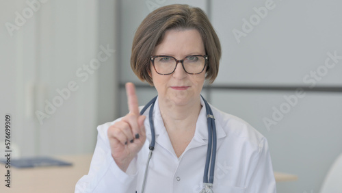 Restricting Senior Doctor with Denying Gesture
