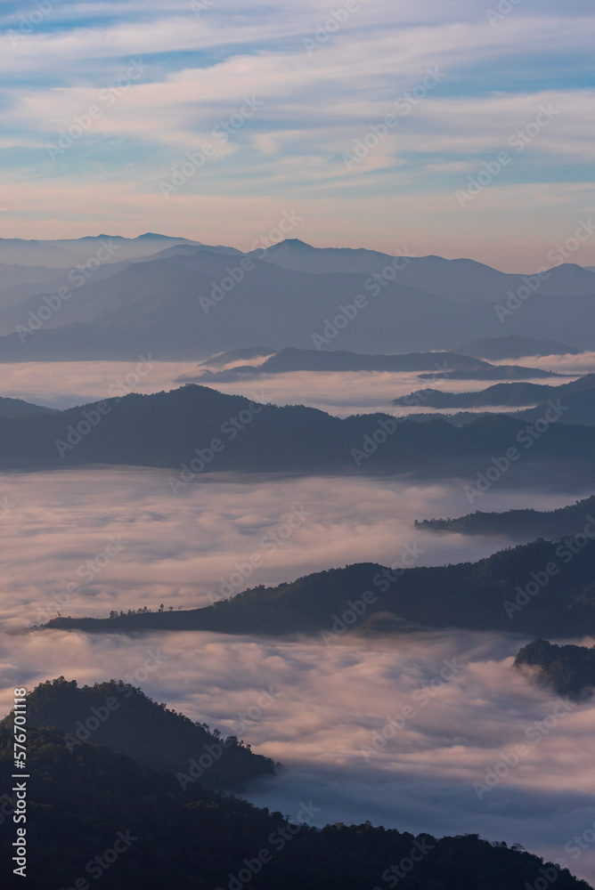 Landscape of the mountain and sea of mist in winter sunrise view from top of Phu Chi Dao mountain , Chiang Rai, Thailand