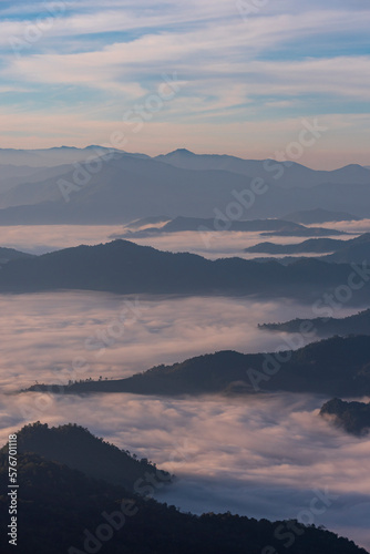 Landscape of the mountain and sea of mist in winter sunrise view from top of Phu Chi Dao mountain , Chiang Rai, Thailand