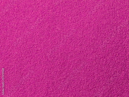 Dyed sand for creative activities, real texture and grains, pink pigment, photo