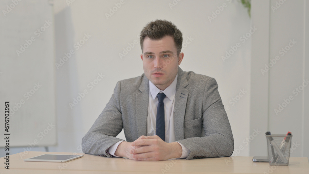 Distraught Young Businessman in Depression and Anxiety Distraught Young Businessman in Depression and Anxiety