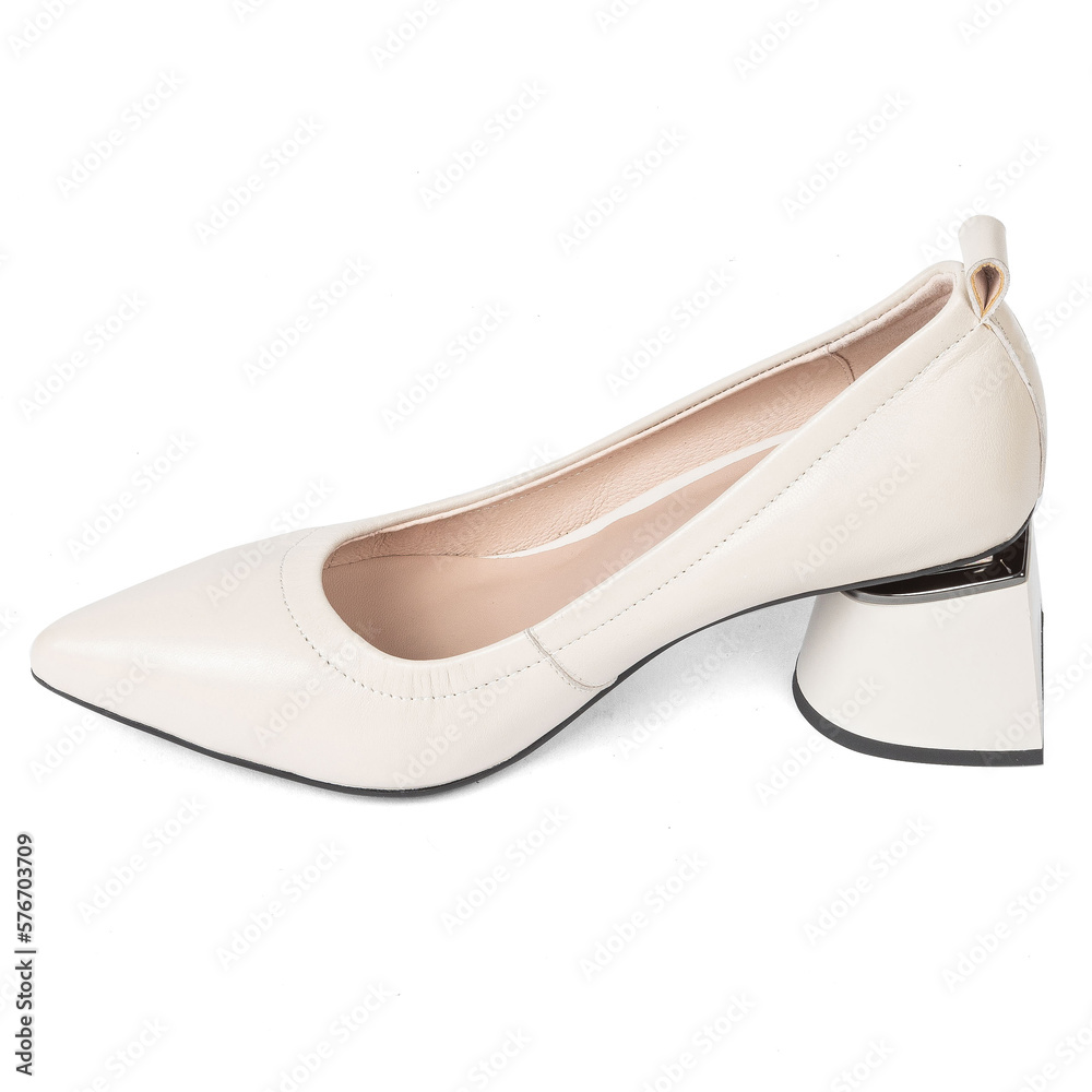 White women's leather shoes with thick heels with a sharp toe on a white background White women's leather shoes with thick heels with a sharp toe on a white background