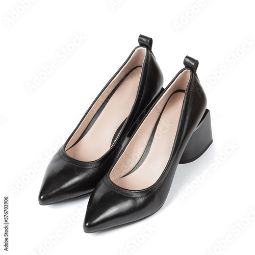 Black women's leather shoes with thick heels with a sharp toe on a white background