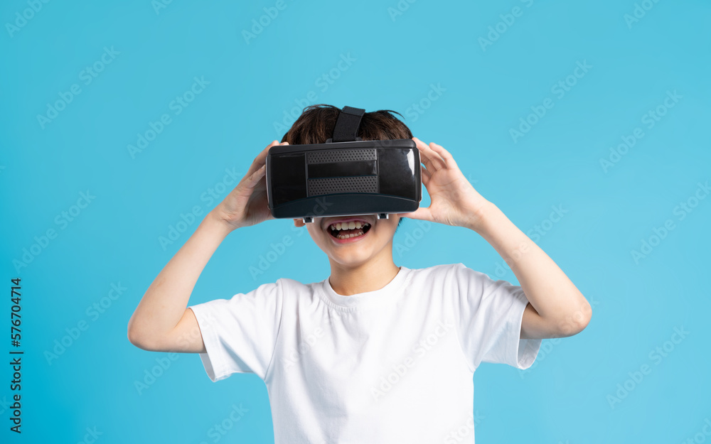 Asian boy portrait on blue background Asian boy portrait on blue background