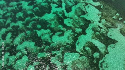 Aerial view of blue water sea in Kuta Lombok, West Nusa Tenggara, Indonesia. photo