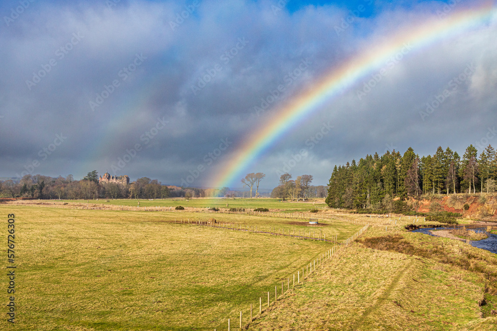 A rainbow over Thirlestane Castle beside Leader Water at Lauder, Scottish Borders, Scotland UK A rainbow over Thirlestane Castle beside Leader Water at Lauder, Scottish Borders, Scotland UK