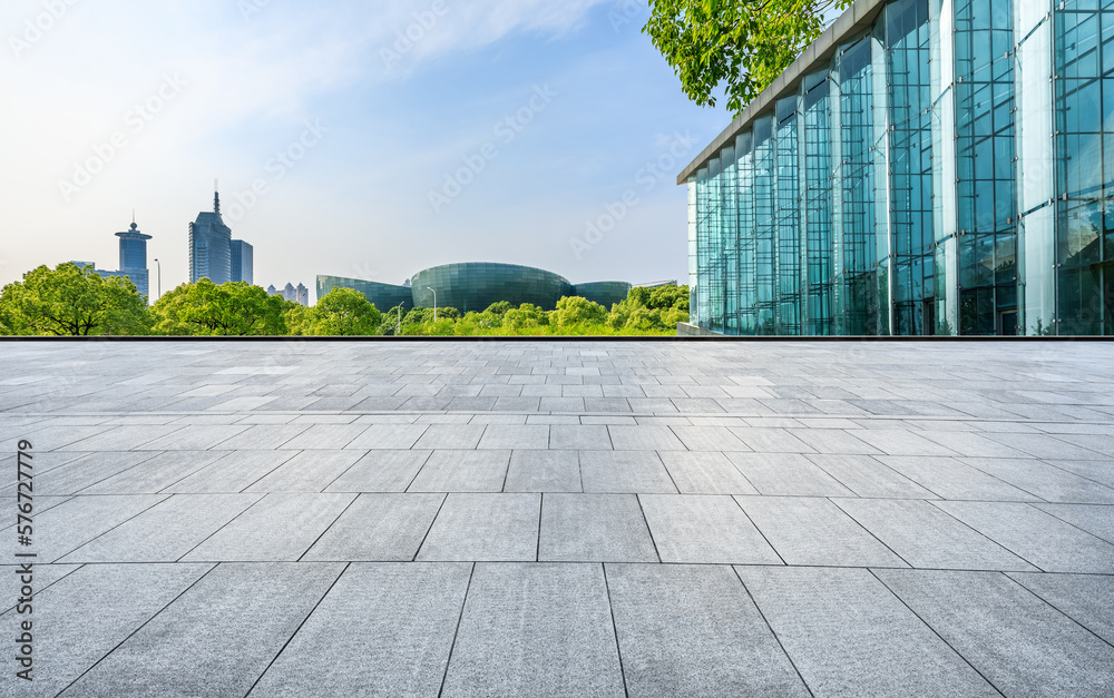 Empty square floor and city skyline with modern buildings in Shanghai, Zhejiang Province, China. - obrazy, fototapety, plakaty 