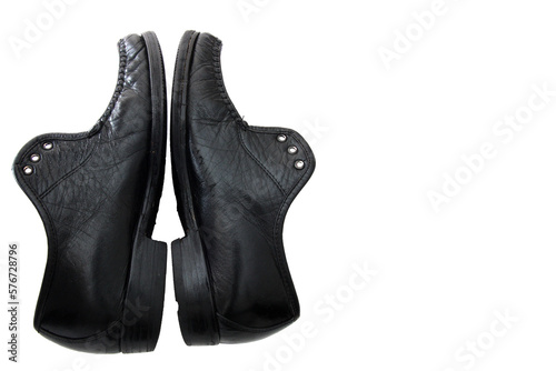 Pair of black old boots isolated on a white background.