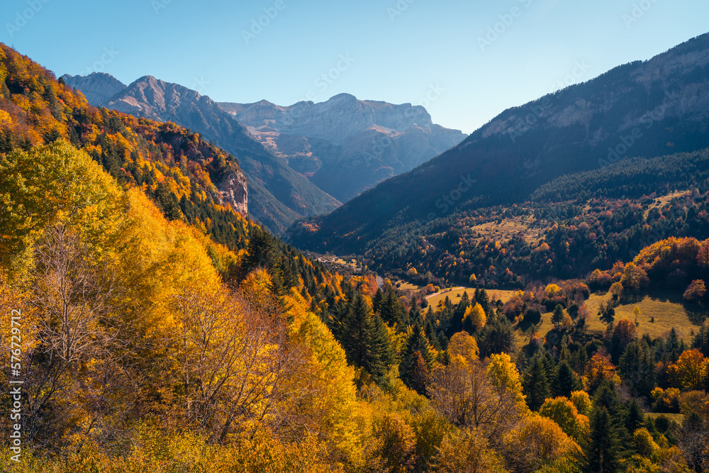Majestic mountainous terrain covered with greenery Majestic mountainous terrain covered with greenery