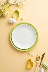 Easter celebration concept. Top view vertical photo of empty dishes easter eggs cutlery baking molds and easter bouquet on isolated pastel beige background