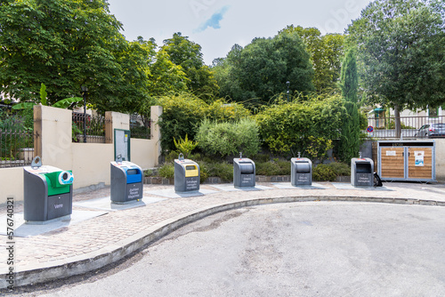 Fototapeta Naklejka Na Ścianę i Meble -  Waste sorting containers in a city in France