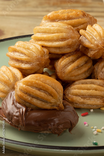 Focus on delicious mini churros with hazelnut.