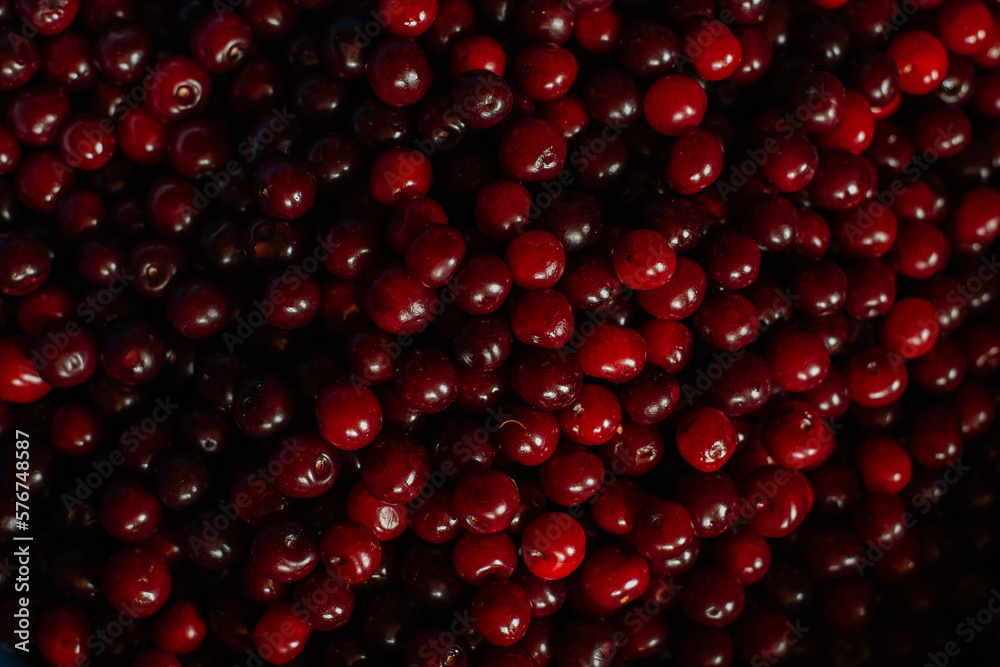 ripe red cherry, dark background, texture ripe red cherry, dark background, texture