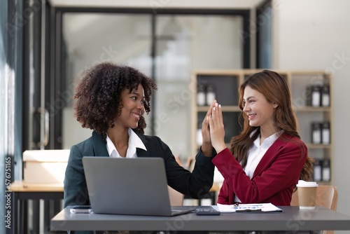 Happy smiling businessman feel happy work complete Teamwork success at work in the office concept