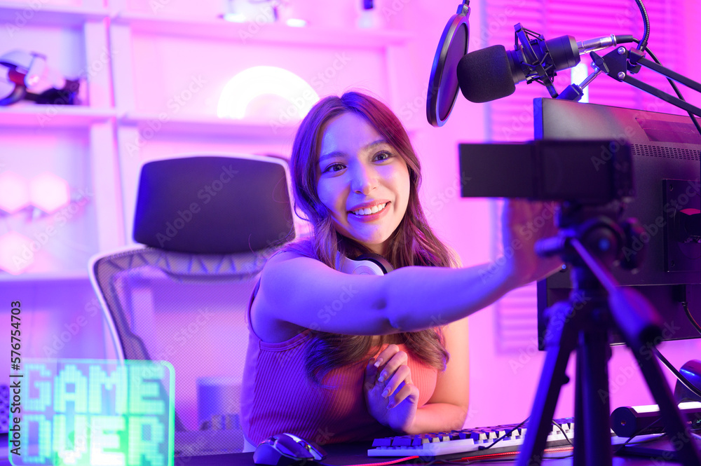 Young Asian Pretty woman Pro Gamer have live streaming , singing and chatting with her fans at home Young Asian Pretty woman Pro Gamer have live streaming , singing and chatting with her fans at home