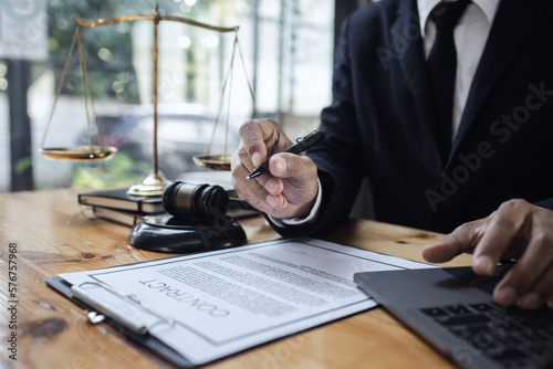 lawyer working with contract agreement at table office, law and justice concept, Selective focus.