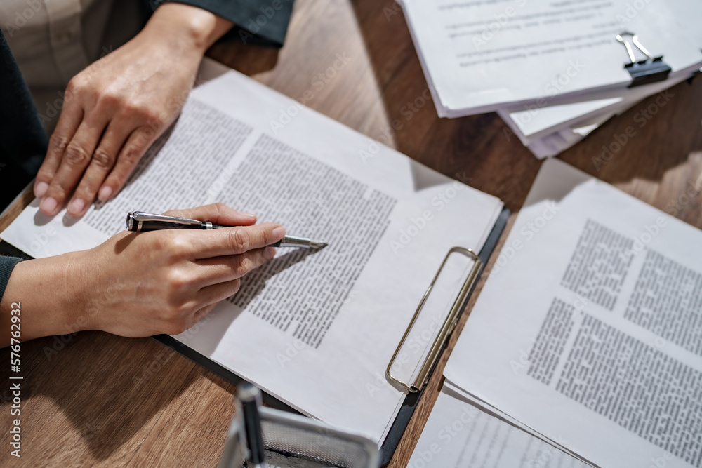 lawyer or judge counselor reading legal contract documents in office. lawyer or judge counselor reading legal contract documents in office.