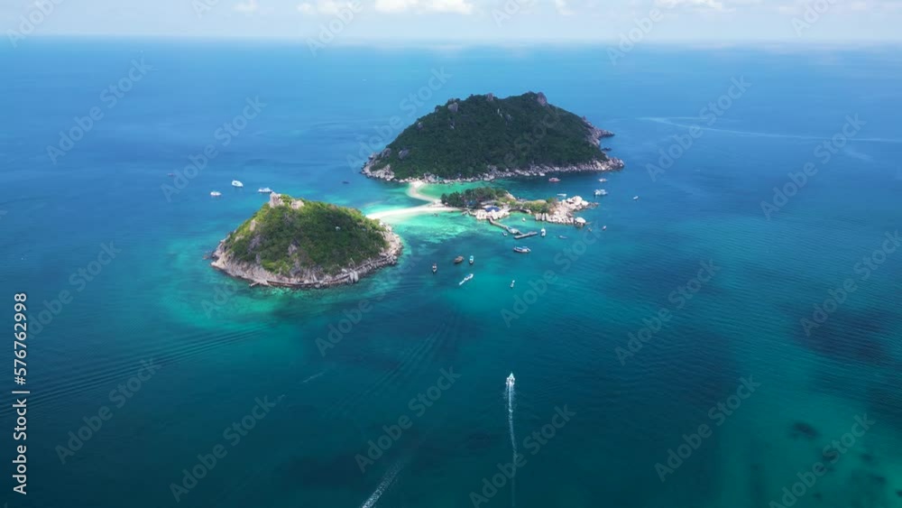 Aerial view of sailing boats along Nang Yuan Island coastline, Surat Thani, Thailand. Aerial view of sailing boats along Nang Yuan Island coastline, Surat Thani, Thailand.