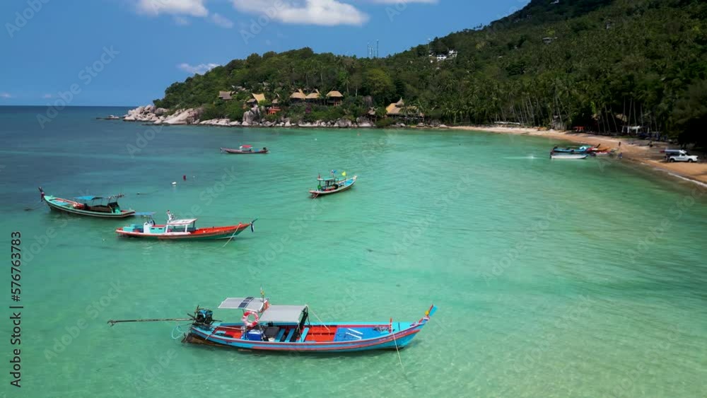 Aerial view of Taxi boats moored along Sairee beach, Ko Tao, Thailand. Aerial view of Taxi boats moored along Sairee beach, Ko Tao, Thailand.
