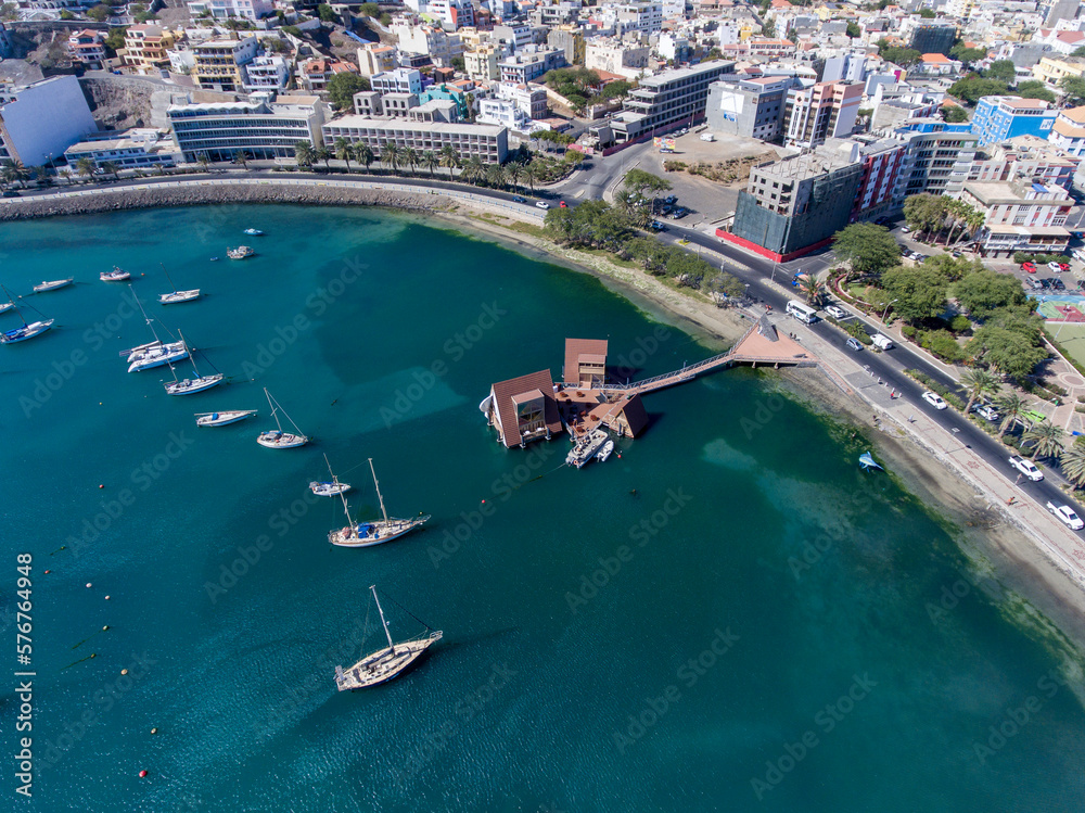 The city of Mindelo, located on the island of São Vicente in Cabo Verde, is a place of vibrant landscapes. It boasts colorful streets, a bustling port, a lively cultural center with music, dance...