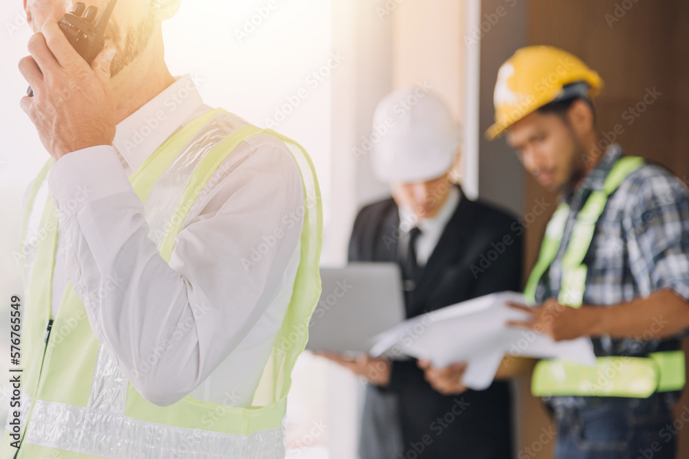 Construction and structure concept of Engineer or architect meeting for project working with partner and engineering tools on model building and blueprint in working site, contract for both companies. Construction and structure concept of Engineer or architect meeting for project working with partner and engineering tools on model building and blueprint in working site, contract for both companies.