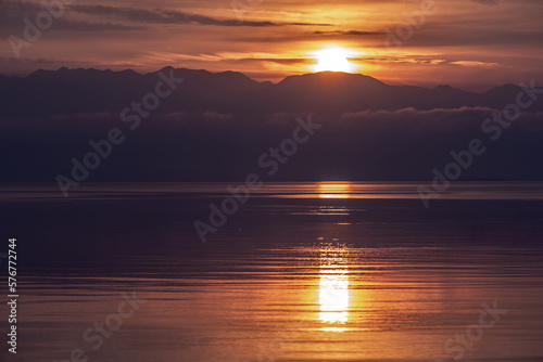 Sunrise with sea and mountains, landscape