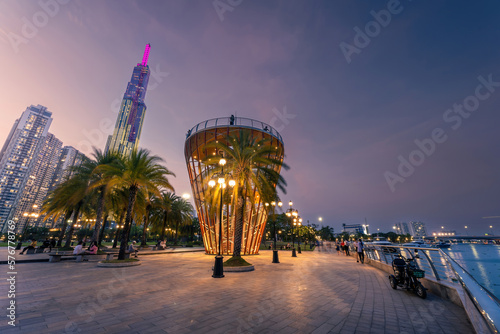 Beautiful night view with colorful sky at Landmark 81 - it is a super tall skyscraper with development buildings along Saigon river in Ho Chi Minh city, Vietnam. © CravenA