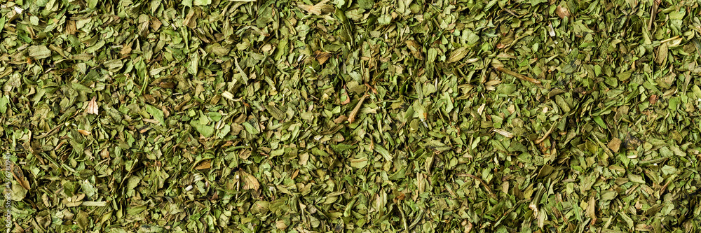 Dried lovage texture. Background with copyspace. Close up. Top view Dried lovage texture. Background with copyspace. Close up. Top view