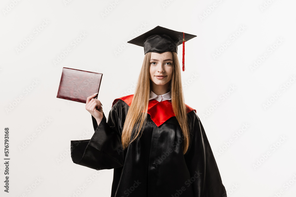 Student with diploma in graduation robe and cap ready to finish college. Future leader of science. Academician young woman in black gown smiling. Student with diploma in graduation robe and cap ready to finish college. Future leader of science. Academician young woman in black gown smiling.