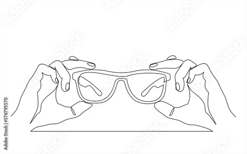 continuous one line vector drawing of hand holding sunglasses. Line art. 