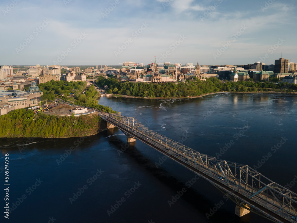 Aerial drone panoramic view of city of Ottawa Alexandra bridge over the Ottawa river and city skyline.