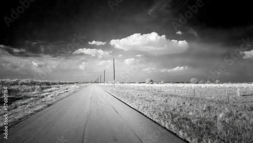 Straight flat road with telephone poles in rural Central Florida USA © Jim Schwabel