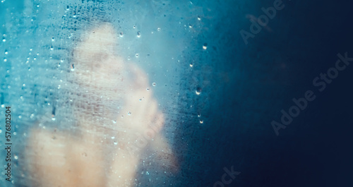 Fototapeta Naklejka Na Ścianę i Meble -  Girl takes a shower, washes her hair.