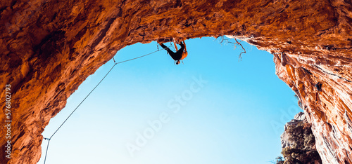 Man is climbing, training in the mountains.
